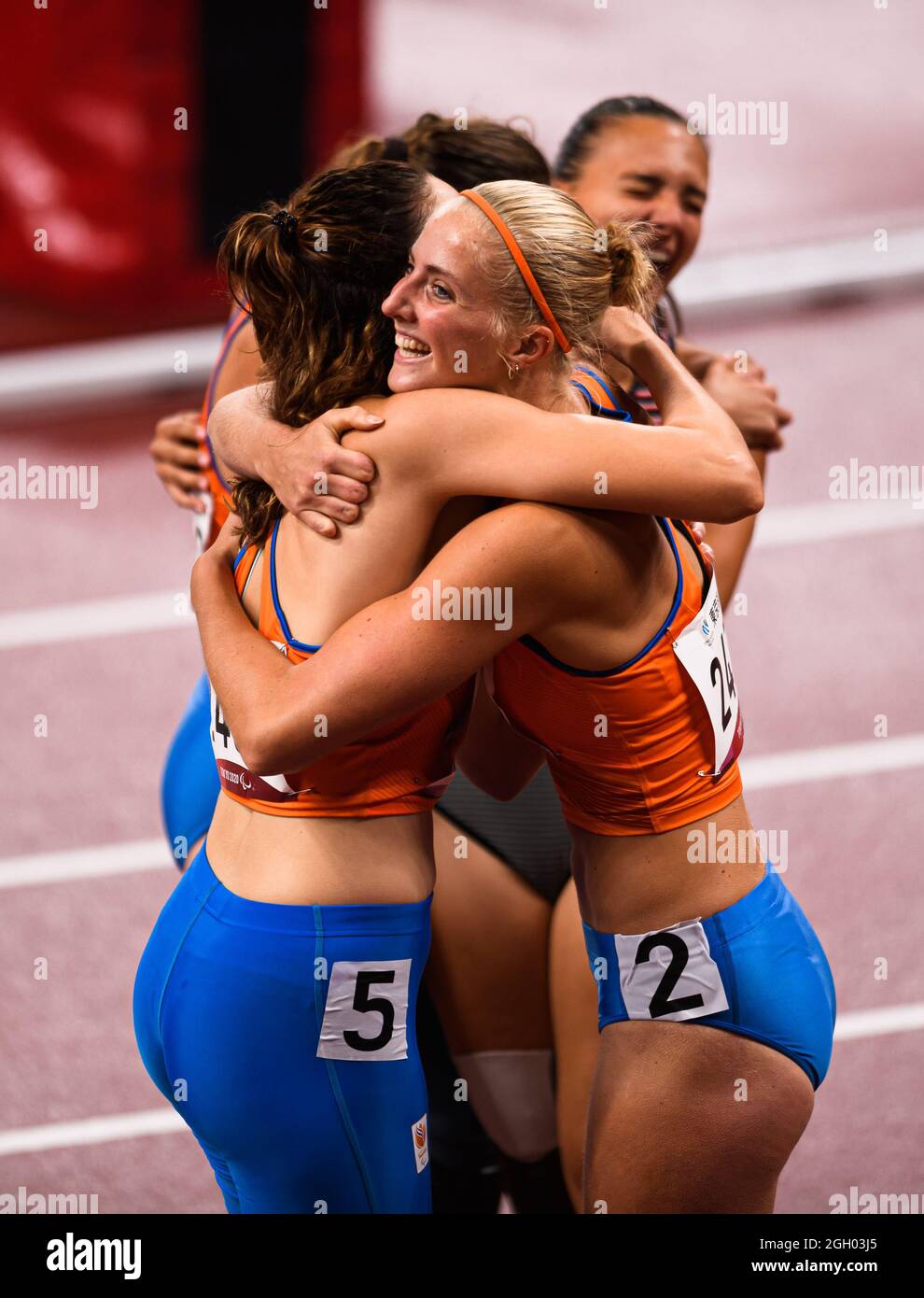 TOKYO, JAPAN. 03th Sep, 2021. (from left) Marlene van Gansewinkel (NED) and Kimberly Alkemade (NED) and Fleur Jong (NED) congratulate each other after competing in the WomenÕs 100m - T64 Final during Track and Field events - Tokyo 2020 Paralympic games at Olympic Stadium on Friday, September 03, 2021 in TOKYO, JAPAN. Credit: Taka G Wu/Alamy Live News Stock Photo