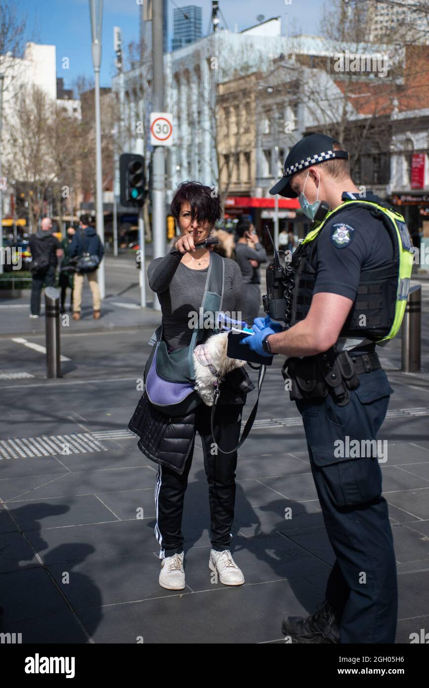 Melbourne, Australia. 4th September 2021. 'No photos thank you!' A planned rally outside the State Library is a bust as very few protesters show up. Credit: Jay Kogler/Alamy Live News Stock Photo