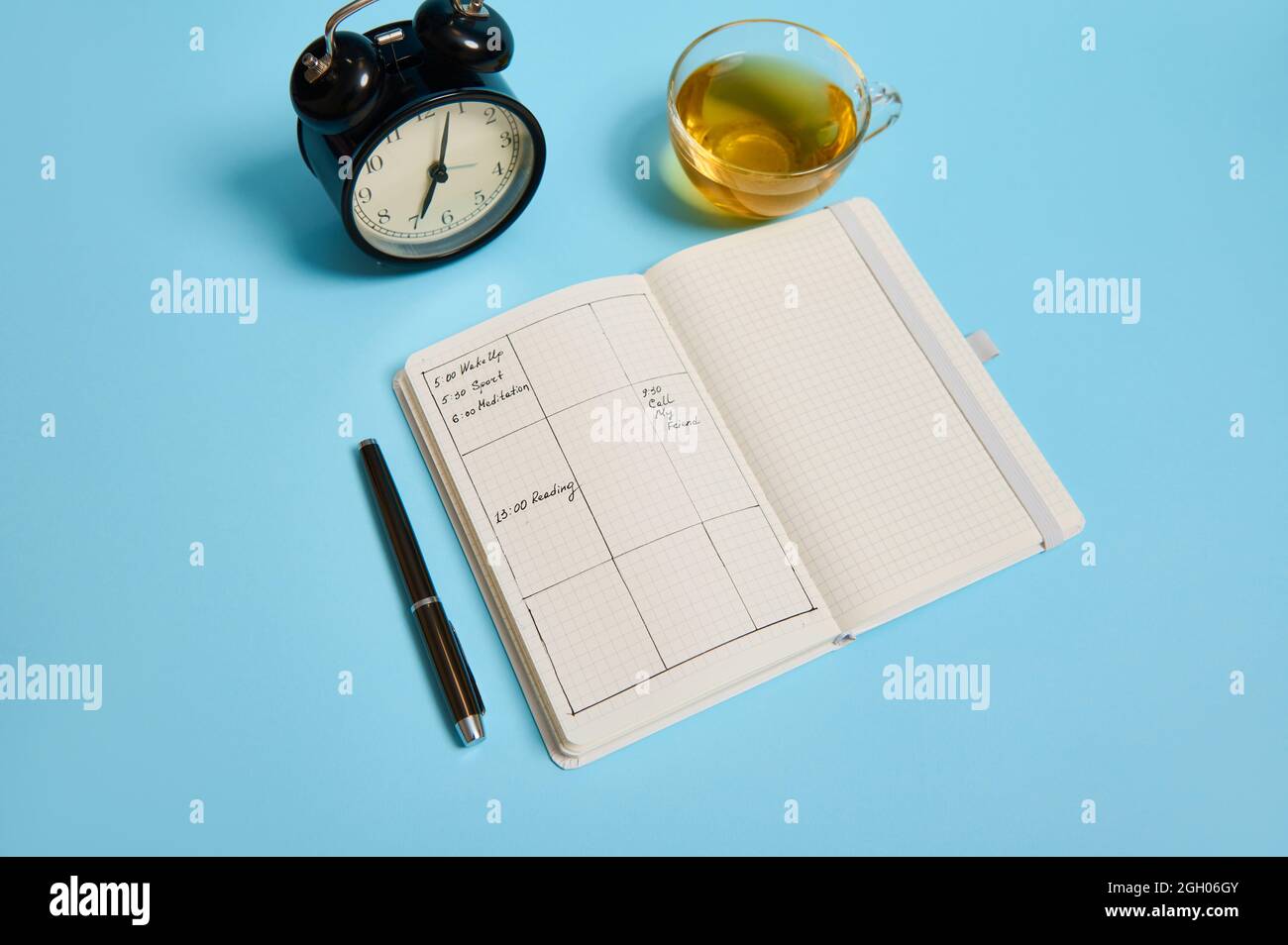 Time management, deadline and schedule concept: alarm clock on schedule ...