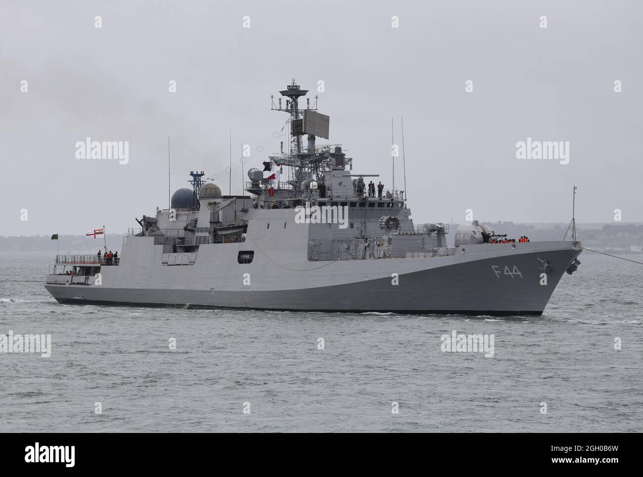 The Indian Navy ship INS TABAR arriving at the Naval Base Stock Photo