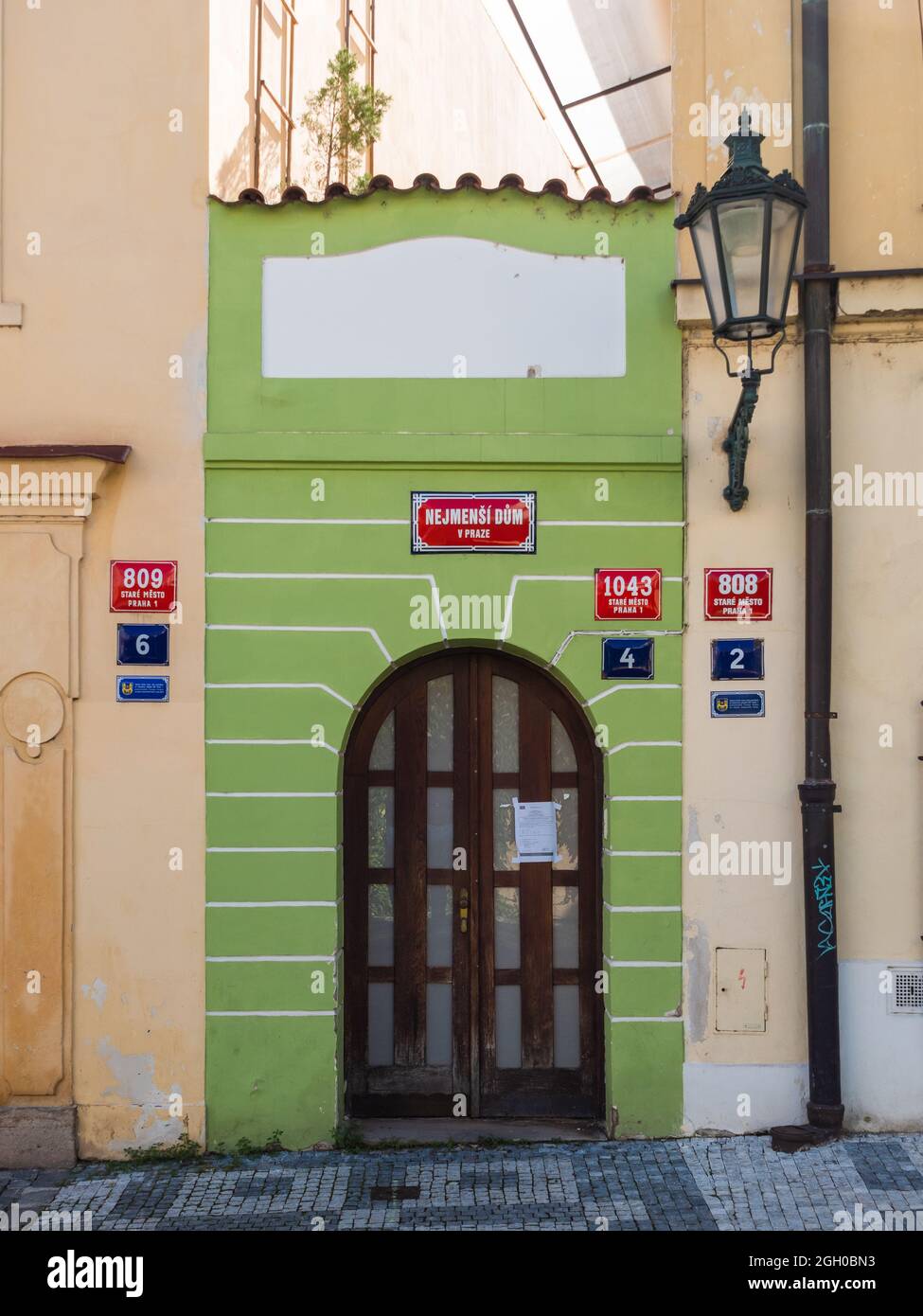 Prague, Czech Republic - July 3 2021: The Smallest House in Prague or Nejmensi Dum v Praze. Stock Photo
