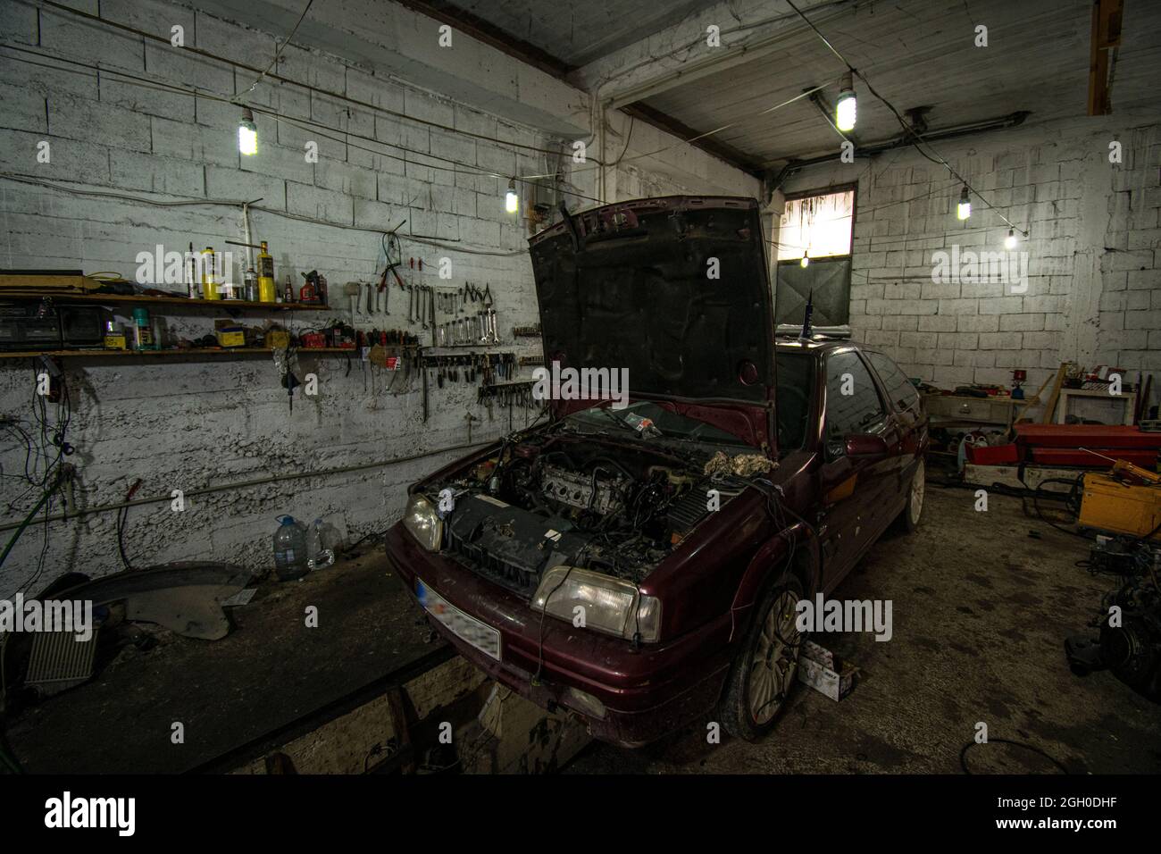 Inside the real car repair shop Stock Photo