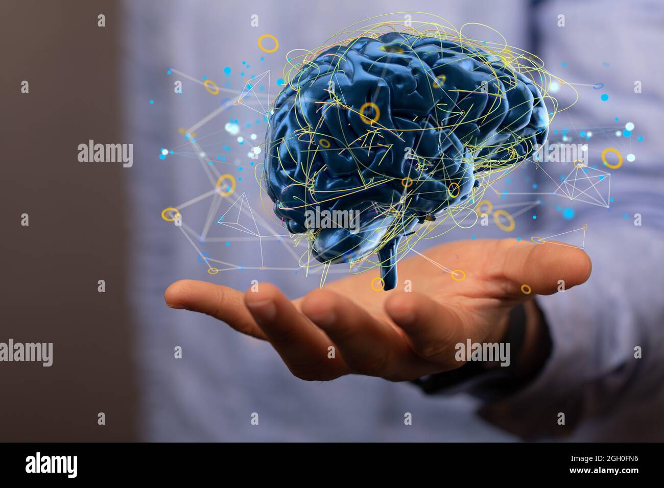 Artificial Intelligence and Machine Learning Concept- digital brain sign floating on a hand Stock Photo