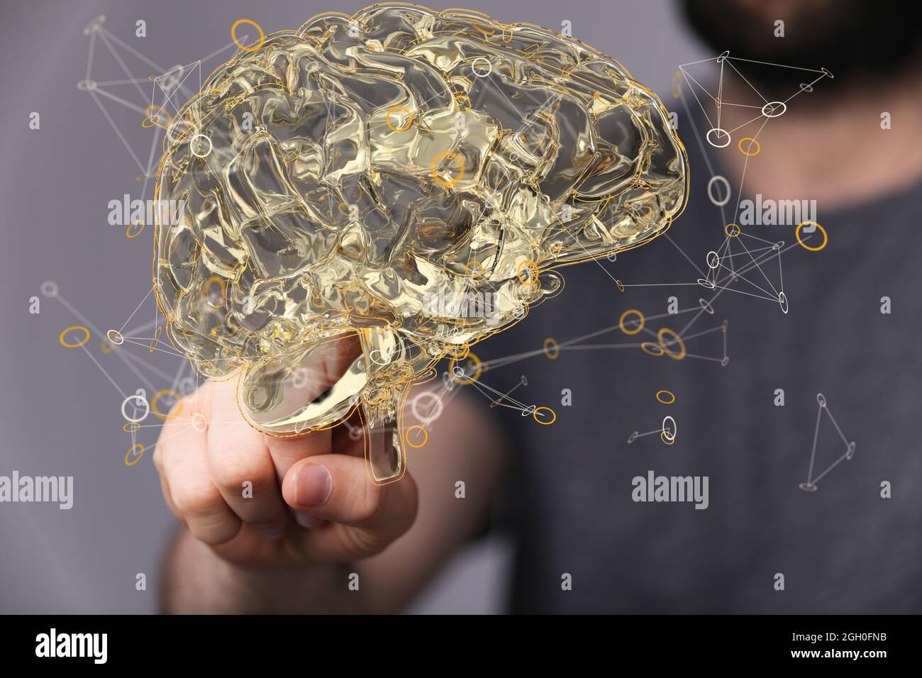 Artificial Intelligence and Machine Learning Concept- digital brain sign floating on a hand Stock Photo