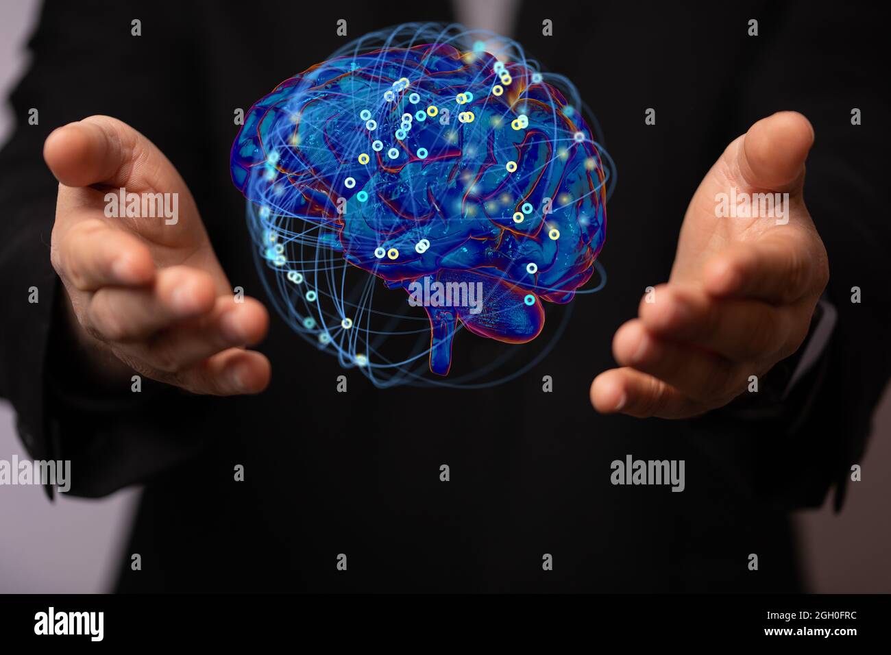 Digital concept of a human brain anatomical model floating on the hand ...