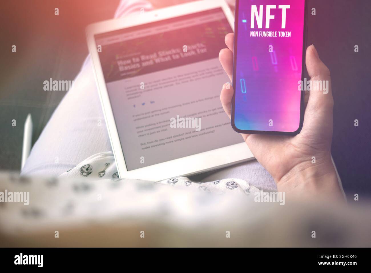 NFT crypto art. Future of freelance concept background. Woman trade with  non fungible token on mobile phone. Logo on the screen photo Stock Photo -  Alamy