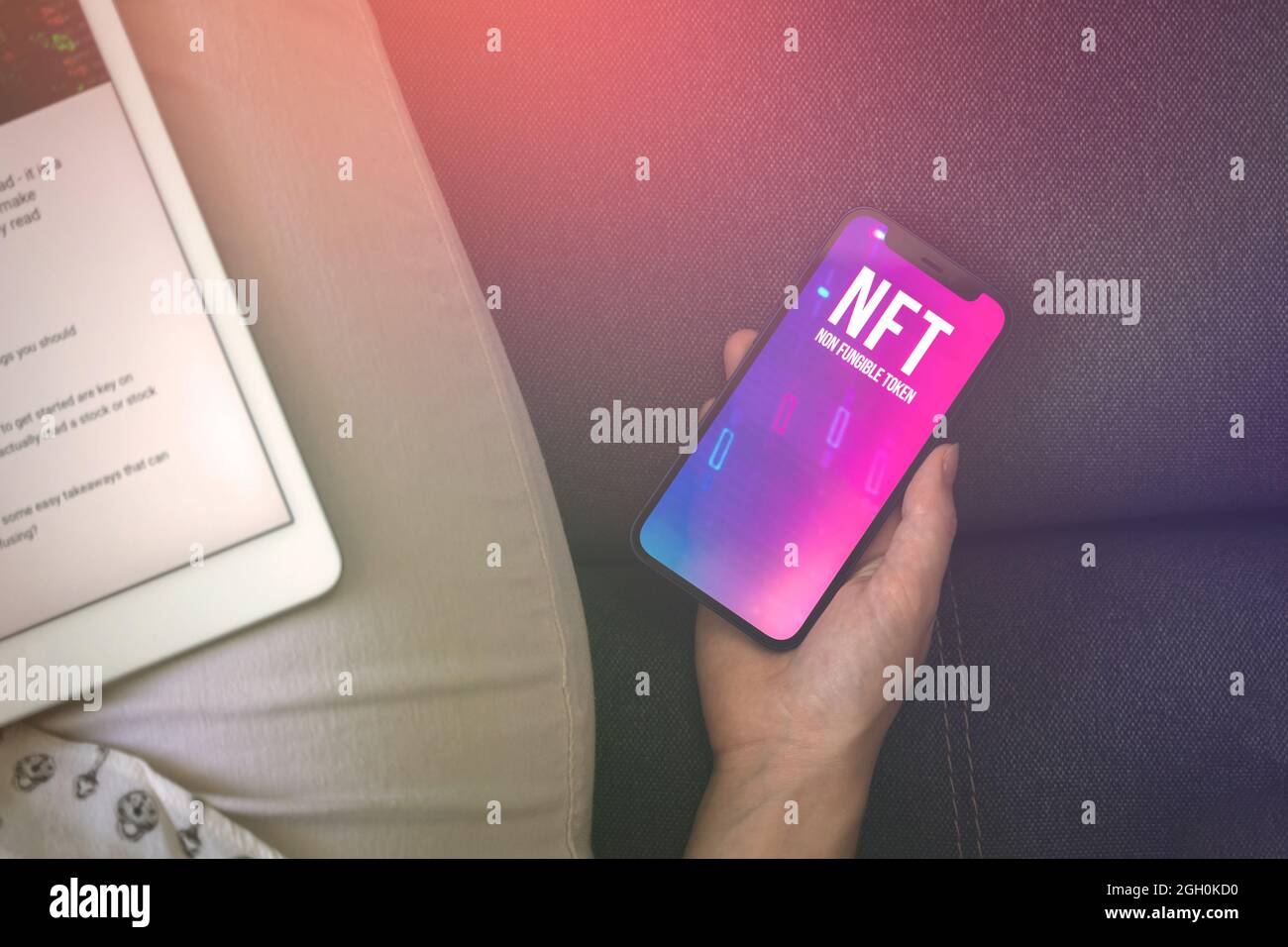 NFT crypto art. Future of freelance concept background. Woman trade with  non fungible token on mobile phone. Logo on the screen photo Stock Photo -  Alamy