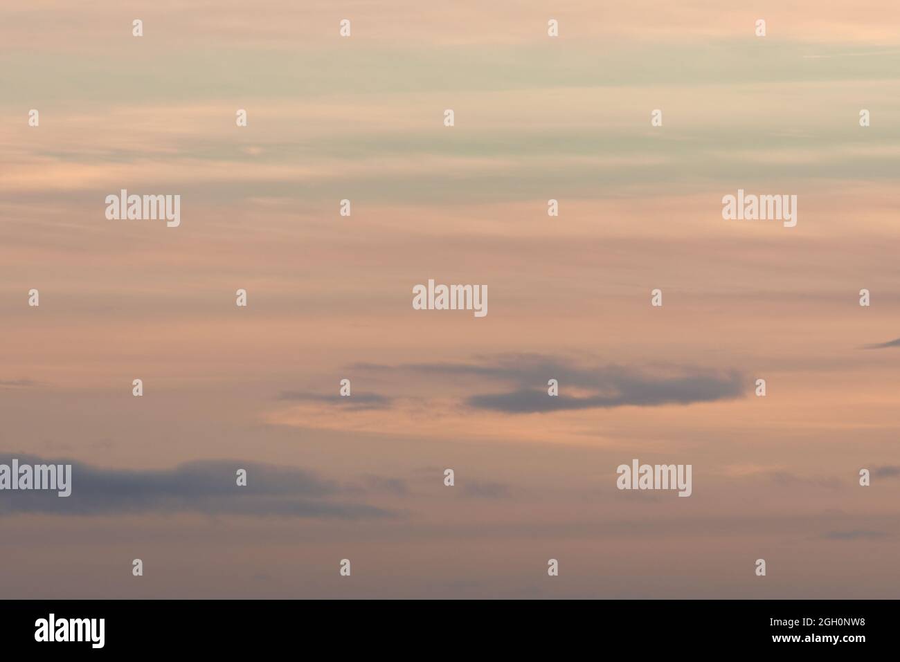 Plain Pastel Color Themed Background Made By A Sky Of Gentle Clouds At Sunset Mainly Orange With Some Blue Very Calm And Wispy Lots Of Copy Space Stock Photo Alamy