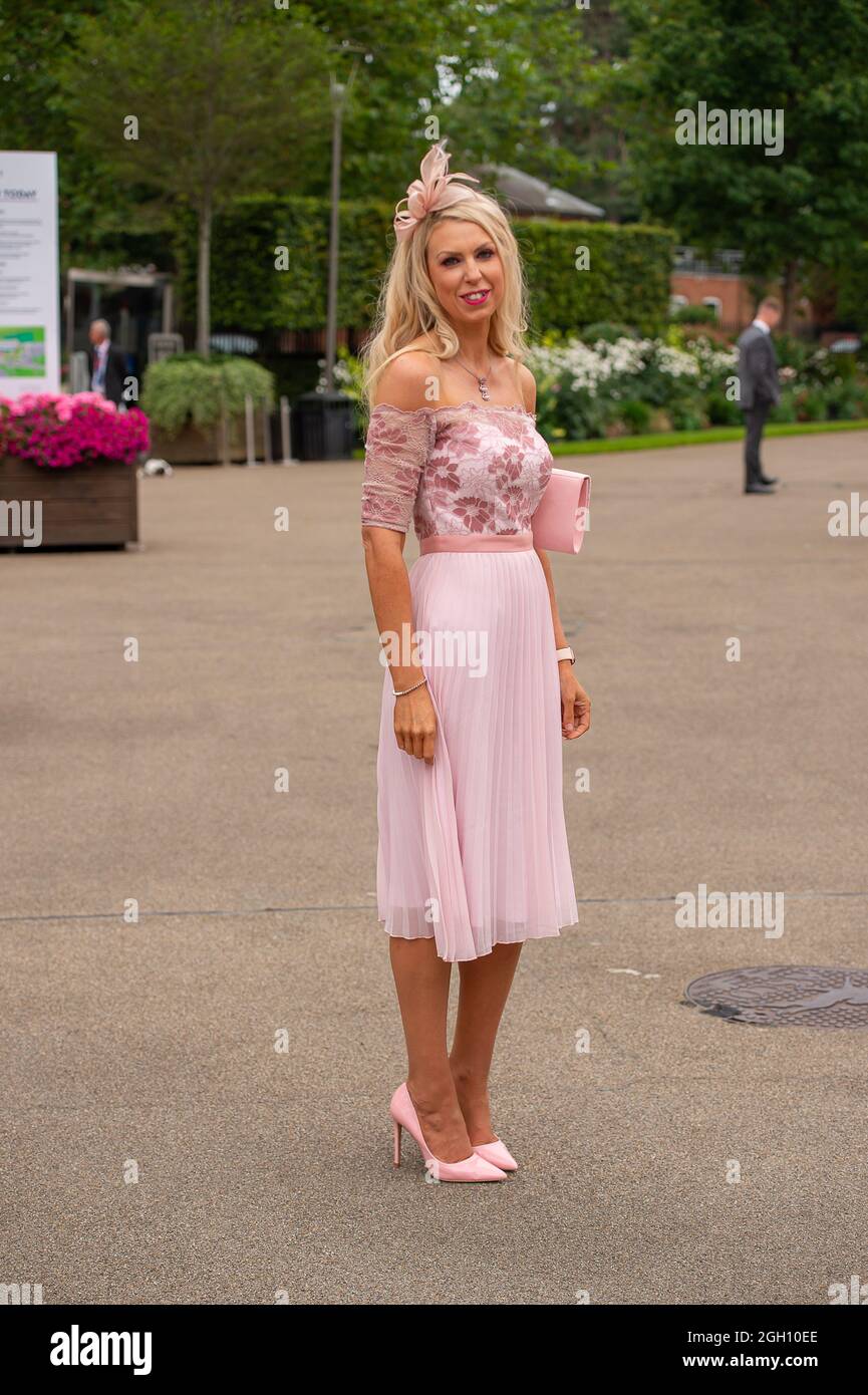 Ascot, Berkshire, UK. 4th September, 2021. A lady wears a pretty pink dress  to Ascot Races today as the weather remains overcast. Credit: Maureen  McLean/Alamy Live News Stock Photo - Alamy