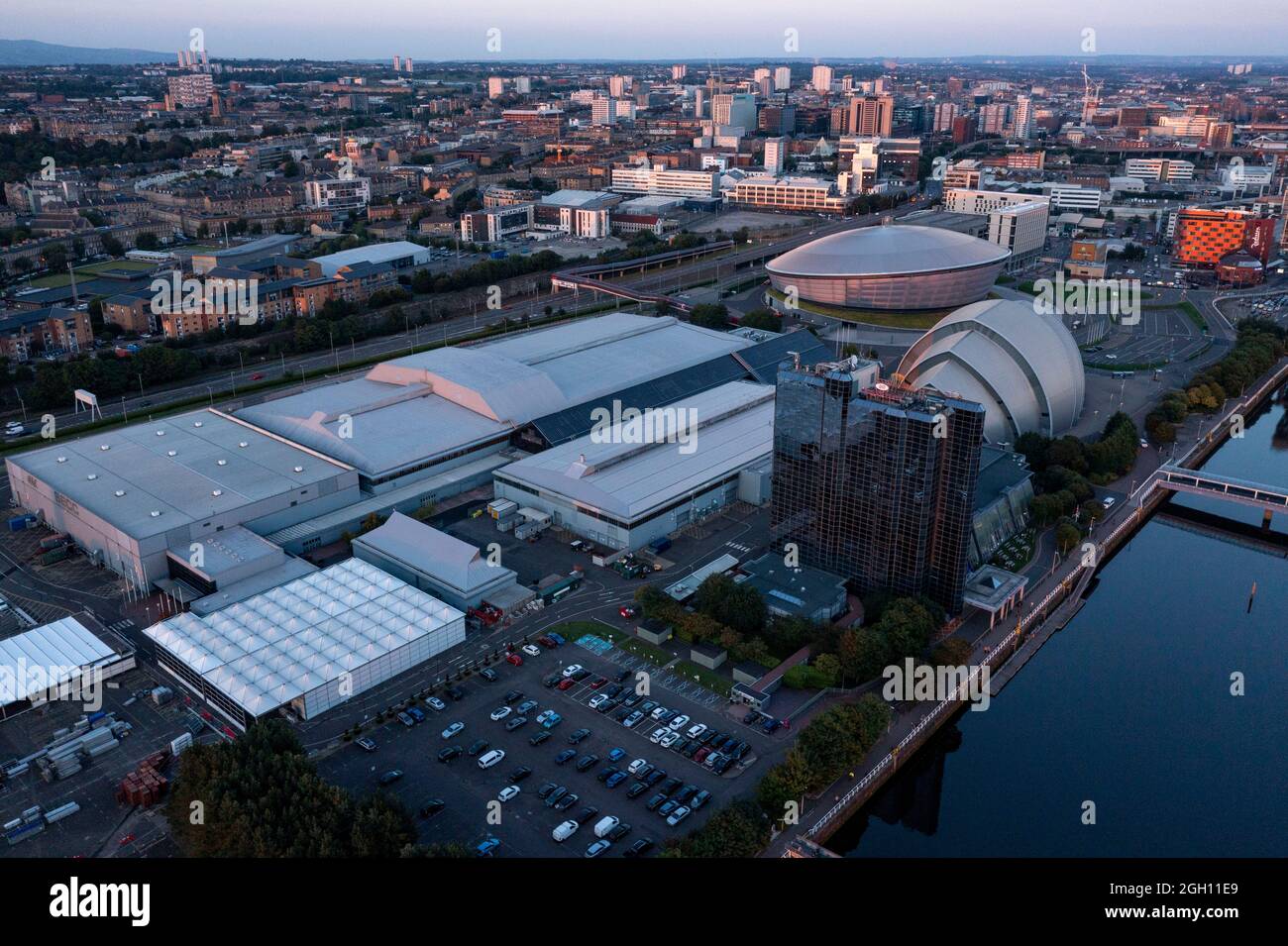 Glasgow, Scotland, 1 September 2021. PICTURED: Drone aerial view looking down from above of the COP26 venue which takes place at Glasgow’s SEC (Scottish Event Campus) which was formerly known as the SECC (Scottish Exhibition and Conference Centre) along with the SEC Armadillo and SSE Hydro Arena which forms the new campus. The Climate Change conference COP26 will be hosted here from 1st to 12th November this year.  Credit: Colin Fisher. Stock Photo