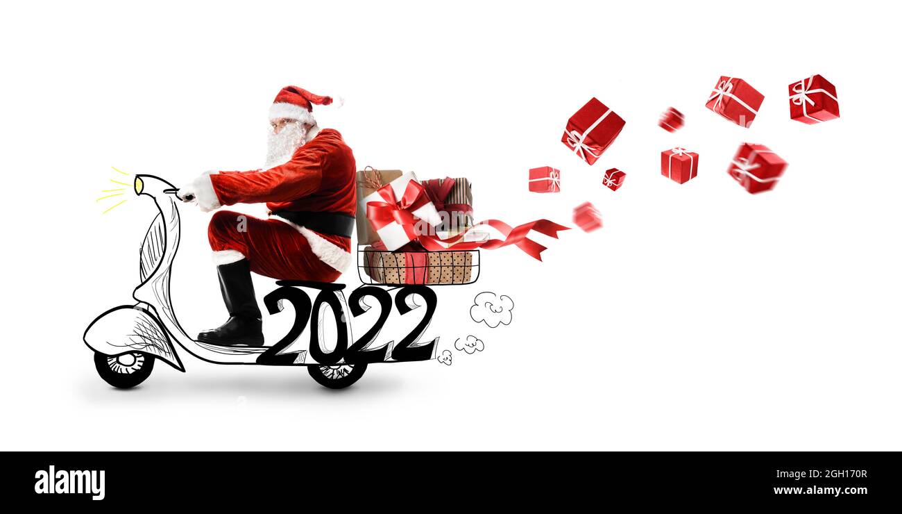 Santa Claus on scooter delivering Christmas or New Year 2022 gifts on white background Stock Photo