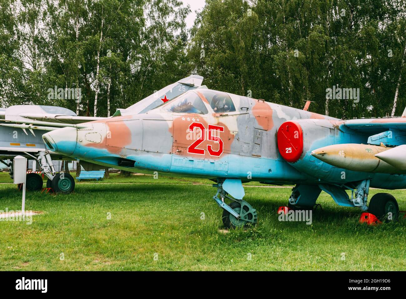 Russian Soviet Armoured Military Subsonic Attack Aircraft Fighter-bomber Stands At Aerodrome. Plane Designed To Provide Close Air Support For Troops Stock Photo