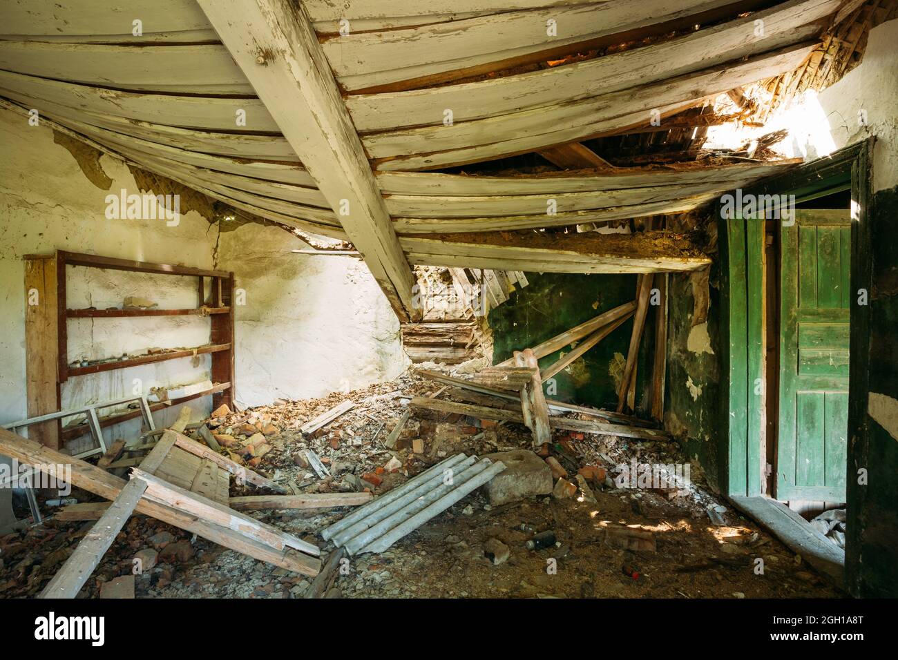 The Interior Of Ruined Abandoned Private Country House With Caved Roof