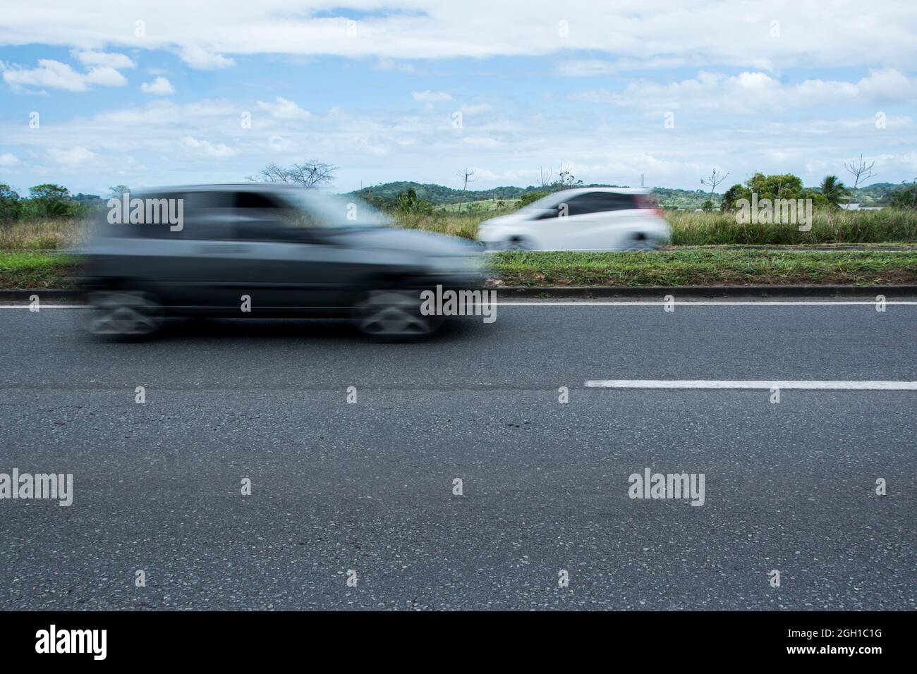 Salvador, Bahia, Brazil - October 08, 2015: Cars moving on the road that connects the cities of Salvador and Feira de Santana. Stock Photo