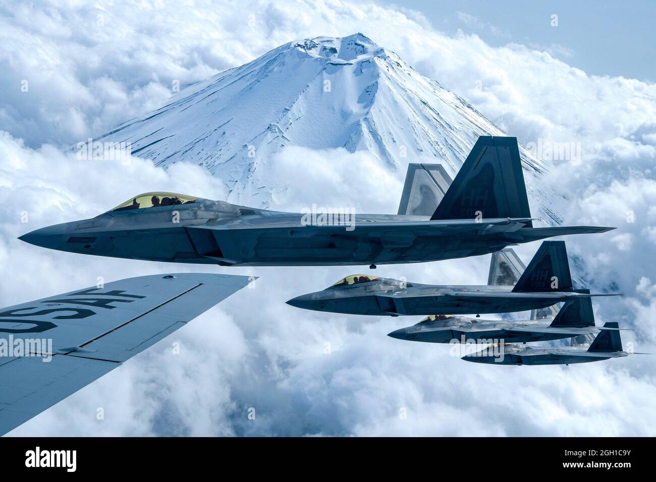 Dynamic Force Employment, F-22, Hawaii Air National Guard, Marine Corps Air Station Iwakuni, Four, Raptors, 199th, Fighter, Squadron, fly, alongside, Stock Photo