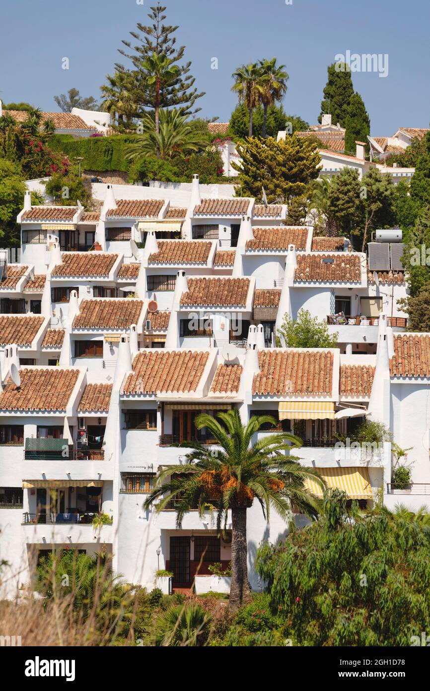 Terraced houses at Torremuelle, Benalmadena Costa, Costa del Sol, Malaga Province, Spain. Stock Photo