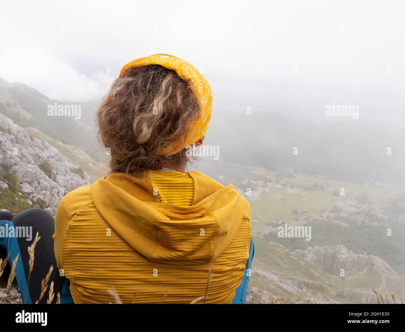 Caucasian female hiker climbing hi-res stock photography and images - Alamy