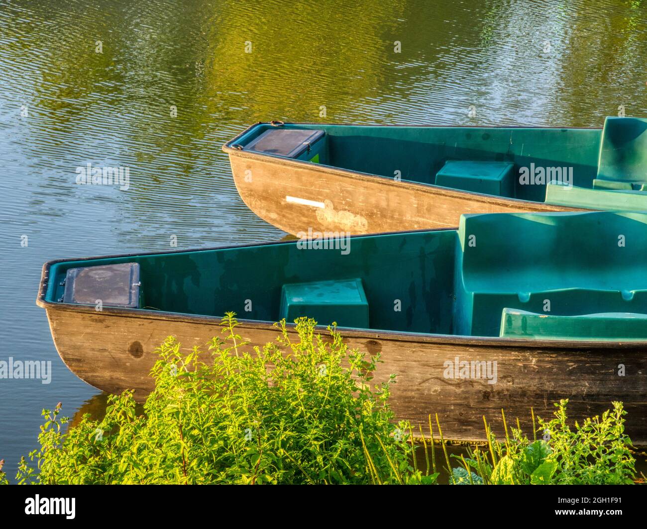 row boats on river bank, Damvix, vendee Department, Pays de Loire, France. Stock Photo
