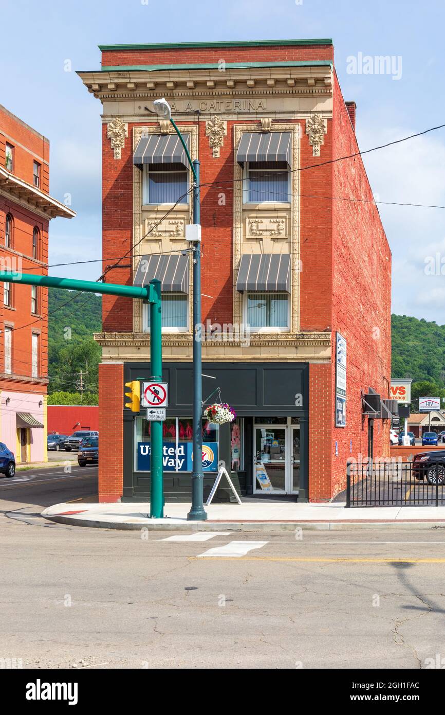 BRADFORD, PA, USA-13 AUGUST 2021: An old commercial building with elaborate facade called the A.A Caterina building, curently housing the United Way. Stock Photo