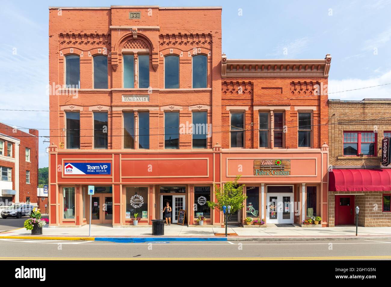 BRADFORD, PA, USA-13 AUGUST 2021: The F.W. Davis building and adjoining building, housing ERA Real Estate, Cummins Nutrition, and Little Fabric Garden Stock Photo