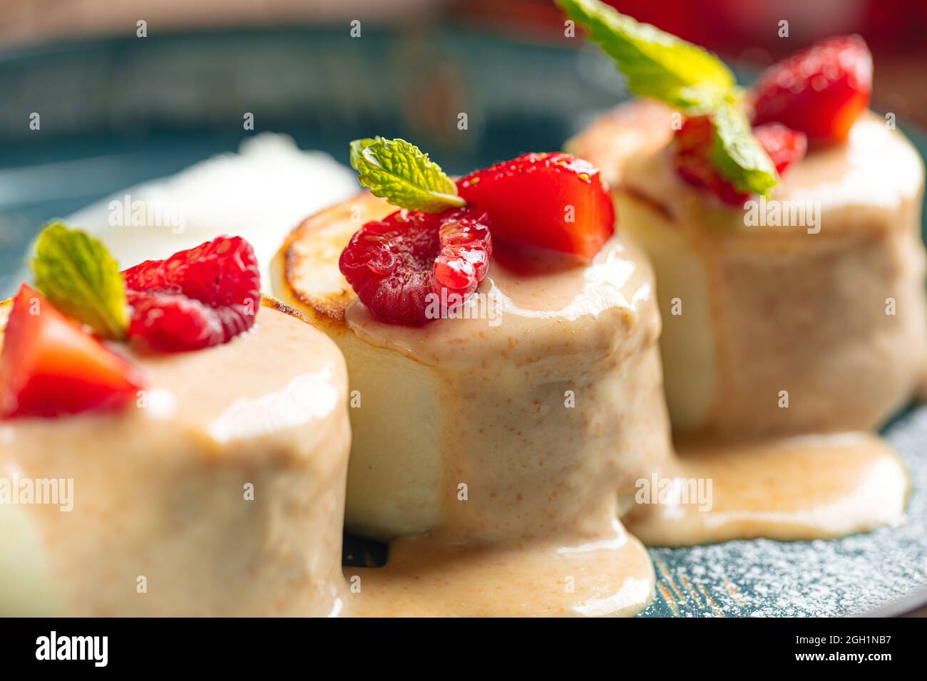 Closeup on cottage cheese pancake with raspberries Stock Photo
