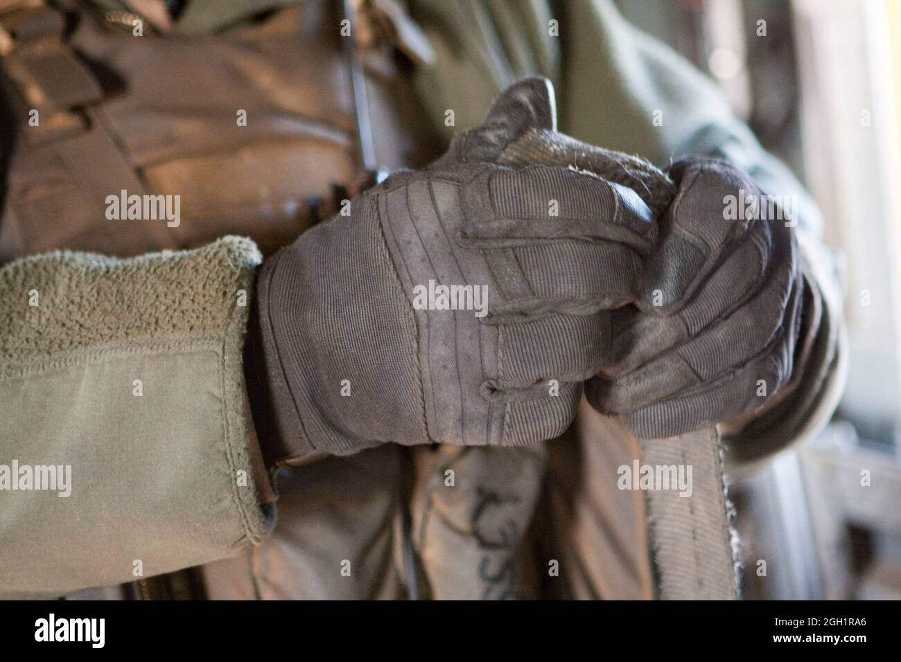 U.S. Marine Corps Gunnery Sgt. Jeremy Miller, crew chief, Marine Heavy Helicopter Squadron 363 (HMH-363), secures equipment after use, Camp Bastion, Helmand province, Afghanistan, Jan. 5. Marines of HMH-363 secure the equipment to ensure accountability and the safeguard of gear. Stock Photo