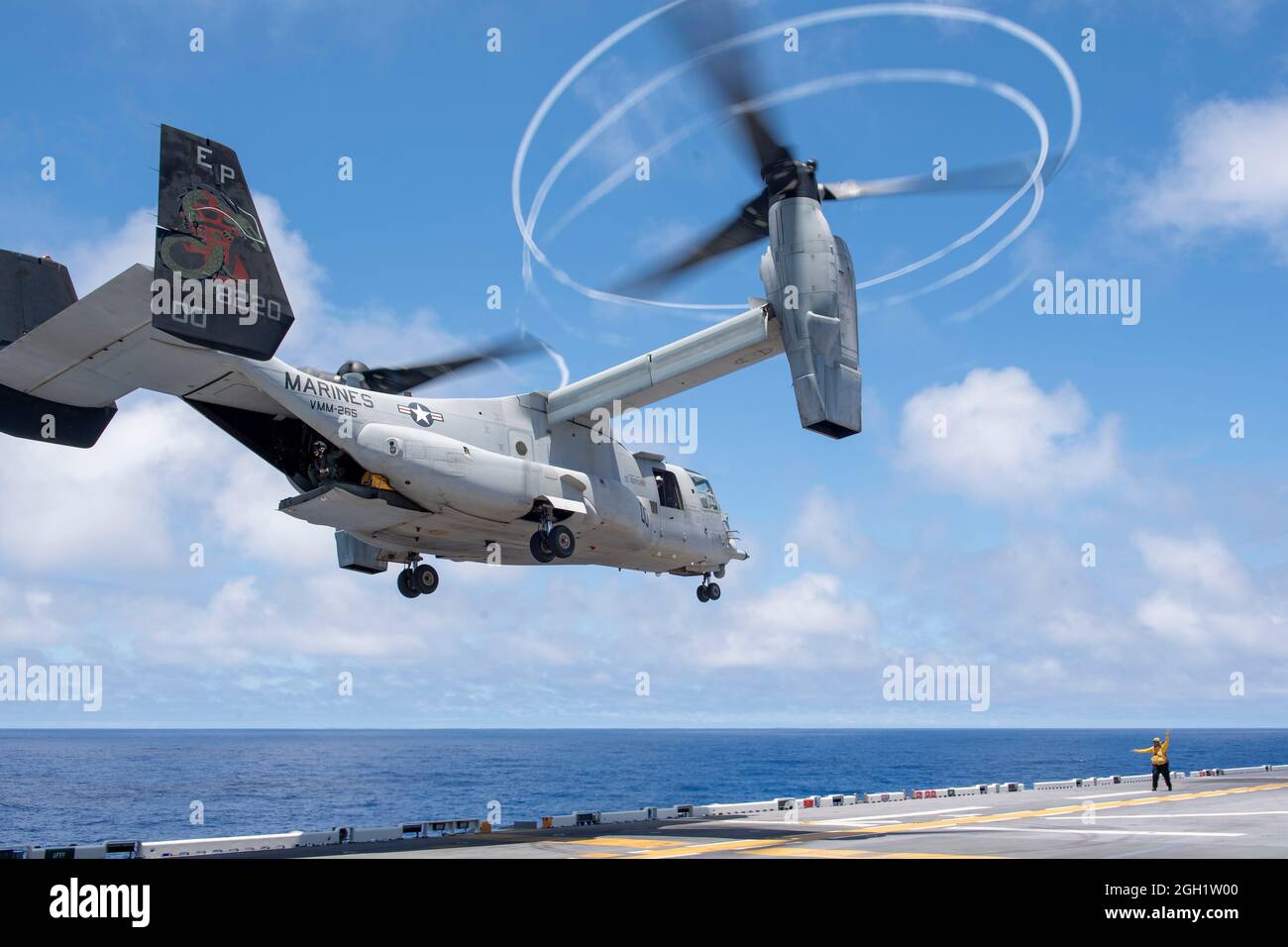 PHILIPPINE SEA (June 2, 2021) An MV-22B Osprey from the 31st Marine Expeditionary Unit (MEU) takes off from the flight deck of the forward-deployed am Stock Photo