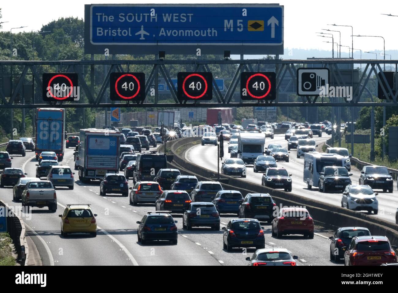 Bristol, UK. 4th Sep, 2021. Prospect of September heatwave brings congestion on the M5 motorway. Speed restrictions are in place on the M5 motorway at Filton due to the volume of traffic heading south towards Devon and Cornwall. Highways England report average speeds below 30 MPH. Credit: JMF News/Alamy Live News Stock Photo