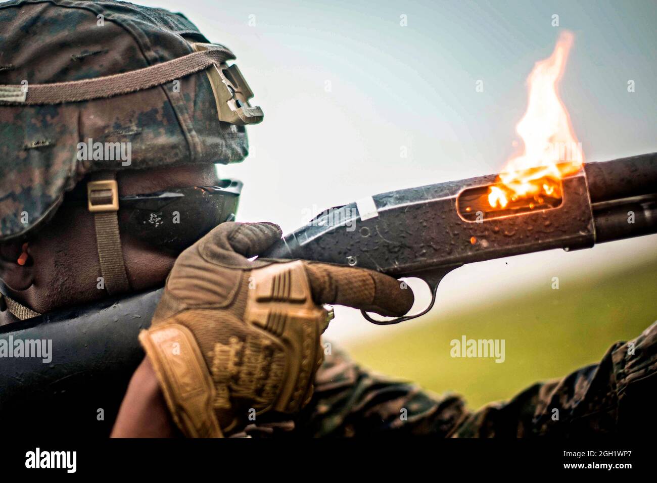U.S. Marine Corps Lance Cpl. Deondre Dennard, a field artillery cannoneer with Charlie Battery, 1st Battalion, 11th Marine Regiment, 1st Marine Divisi Stock Photo