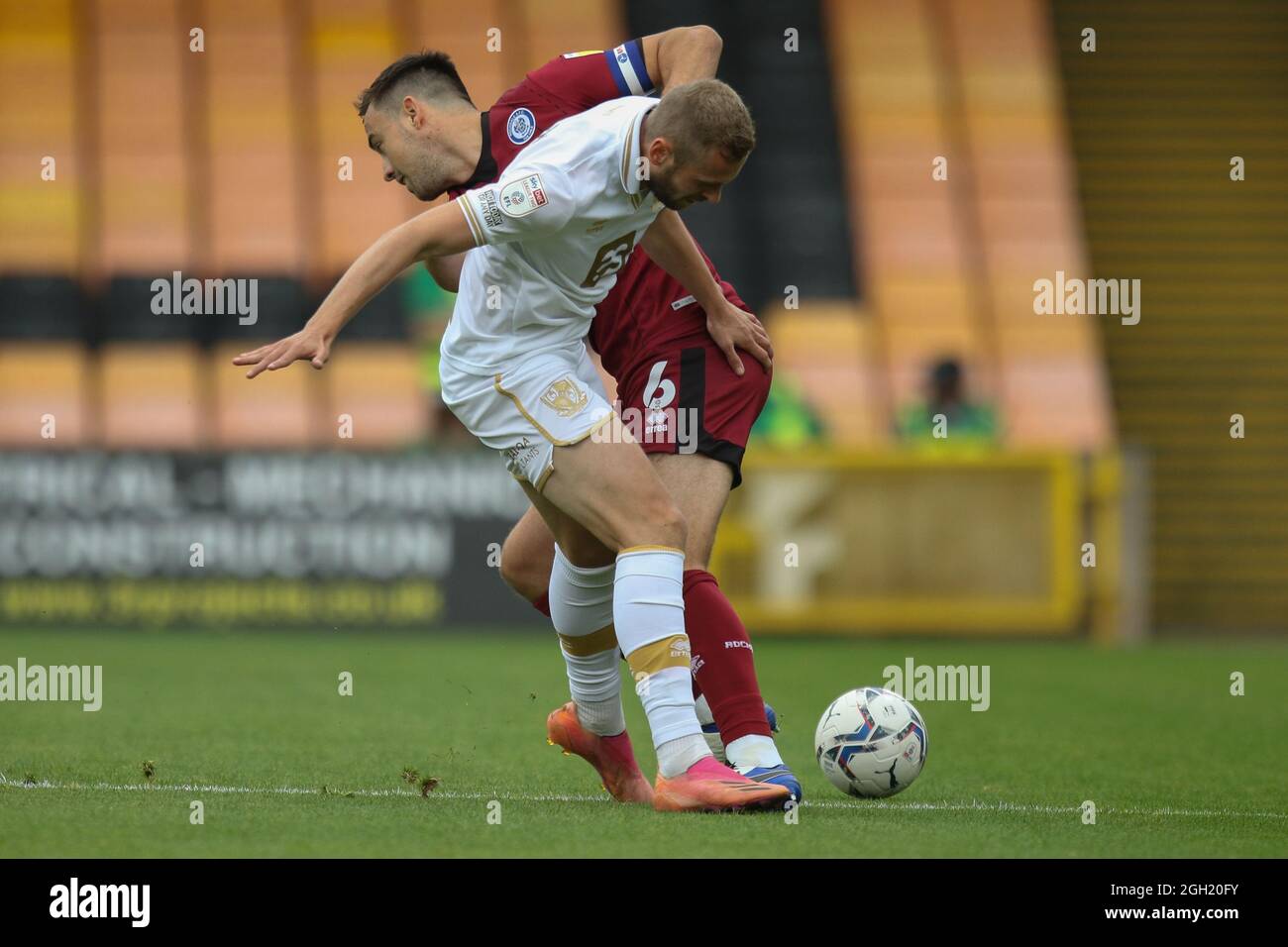 Burslem, UK. 04th Sep, 2021. Rochdale defender Eoghan O'Connell (6) and