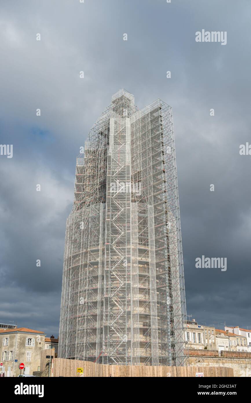 La Rochelle, France. February 15th 2015. Scaffolding during renovation of ancient monument Lantern tower lighthouse at La Rochelle harbour, France Stock Photo