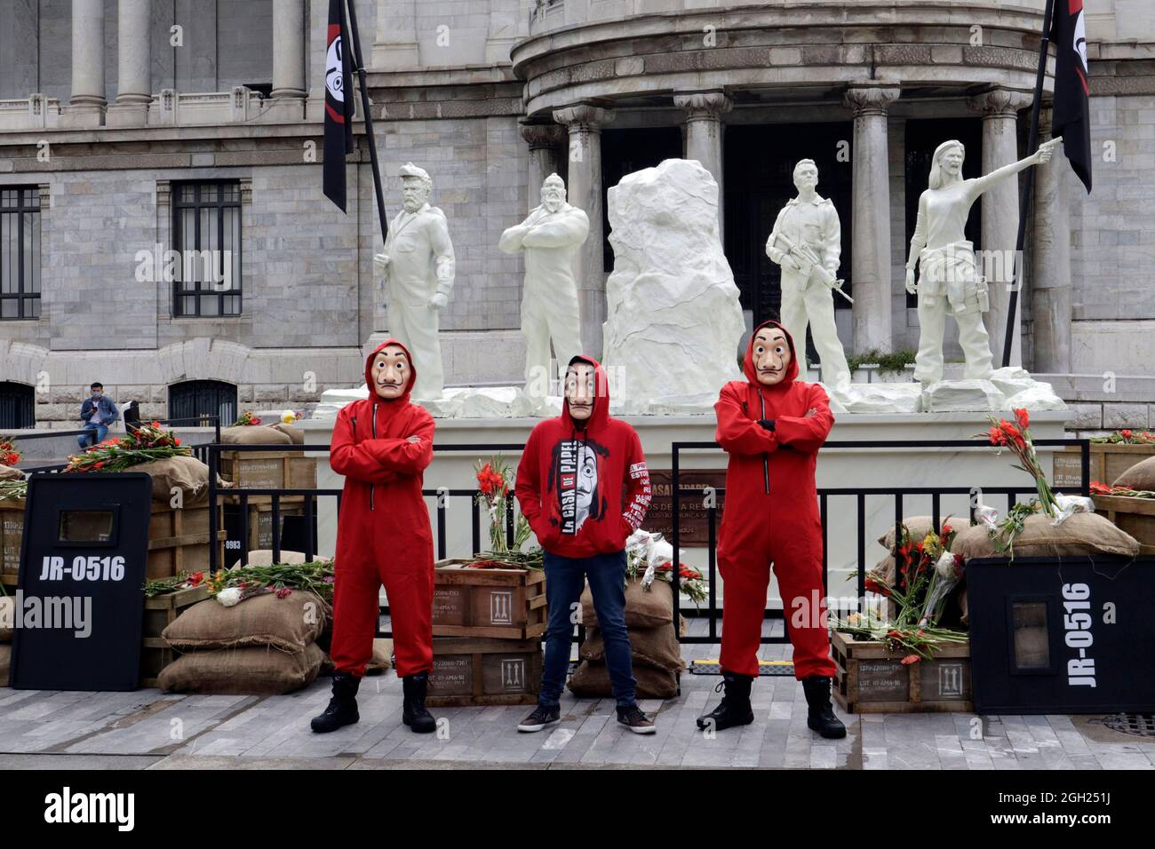 Persons dressed as the characters from the Netflix original series 'La Casa  de Papel' put a set outside the Palacio de Bellas Artes on the occasion of  the launch of the fifth