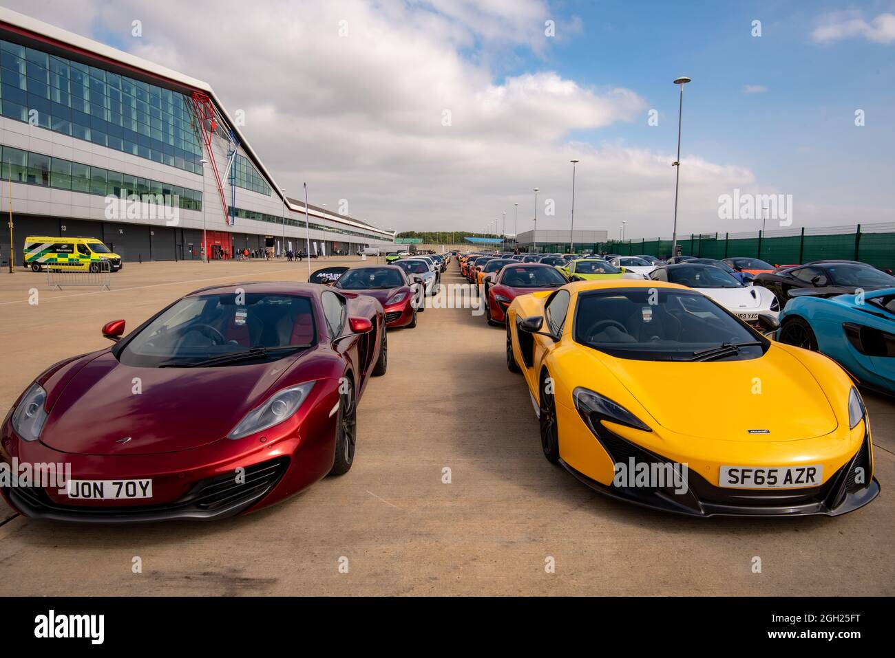 McLaren supercars at the Silverstone Circuit for a parade by members of the McLaren Owners Club Stock Photo