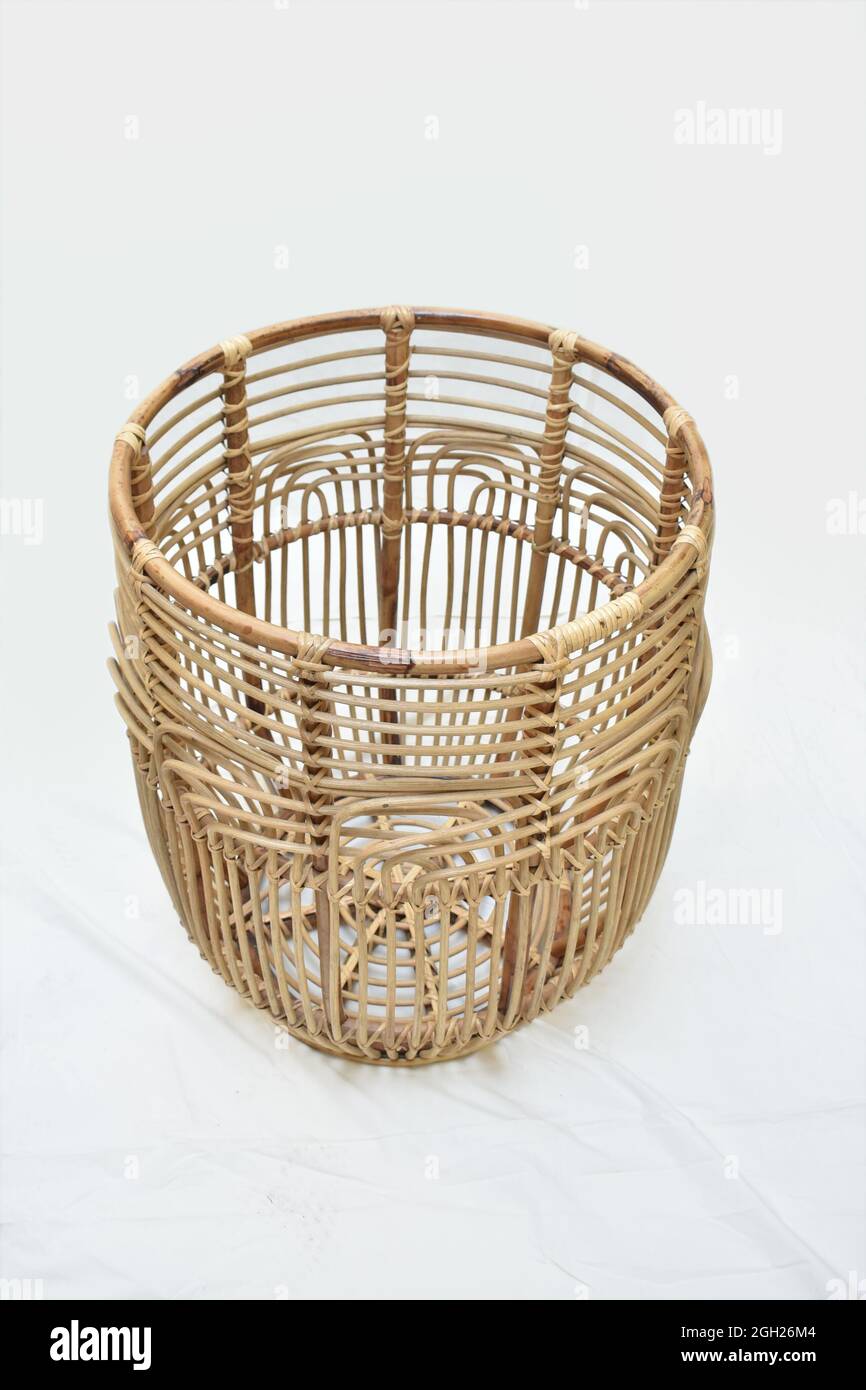 cane round basket on white background selective soft focus Stock Photo
