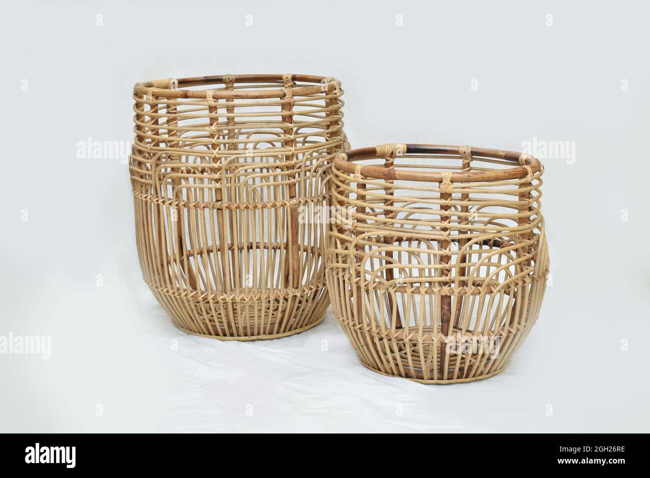 cane round basket on white background selective soft focus Stock Photo