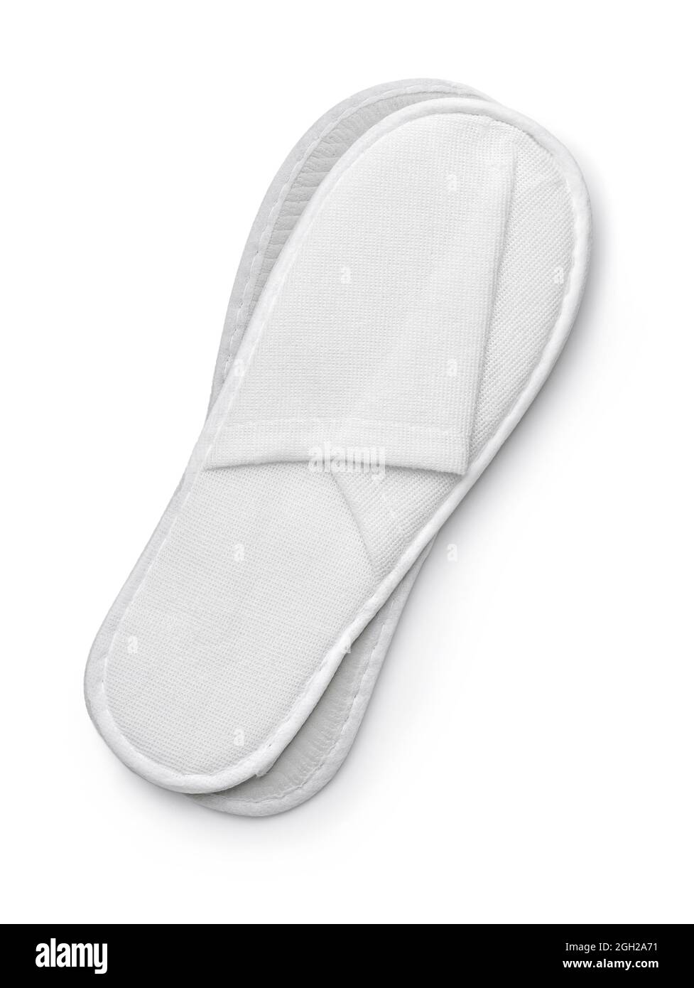 Top view of white disposable slippers isolated on white Stock Photo