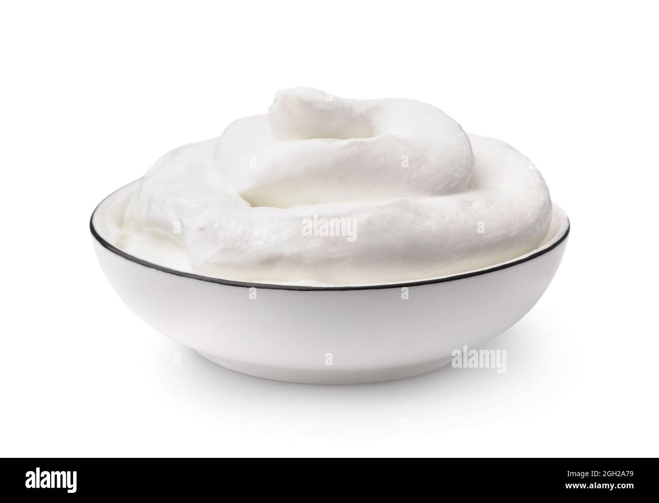 Bowl of fresh organic greek yogurt isolated on white Stock Photo