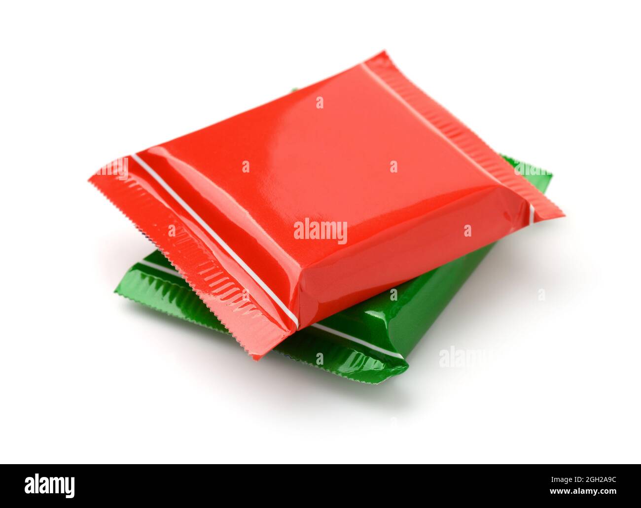 Red and green  plastic chocolate packaging isolated on white Stock Photo