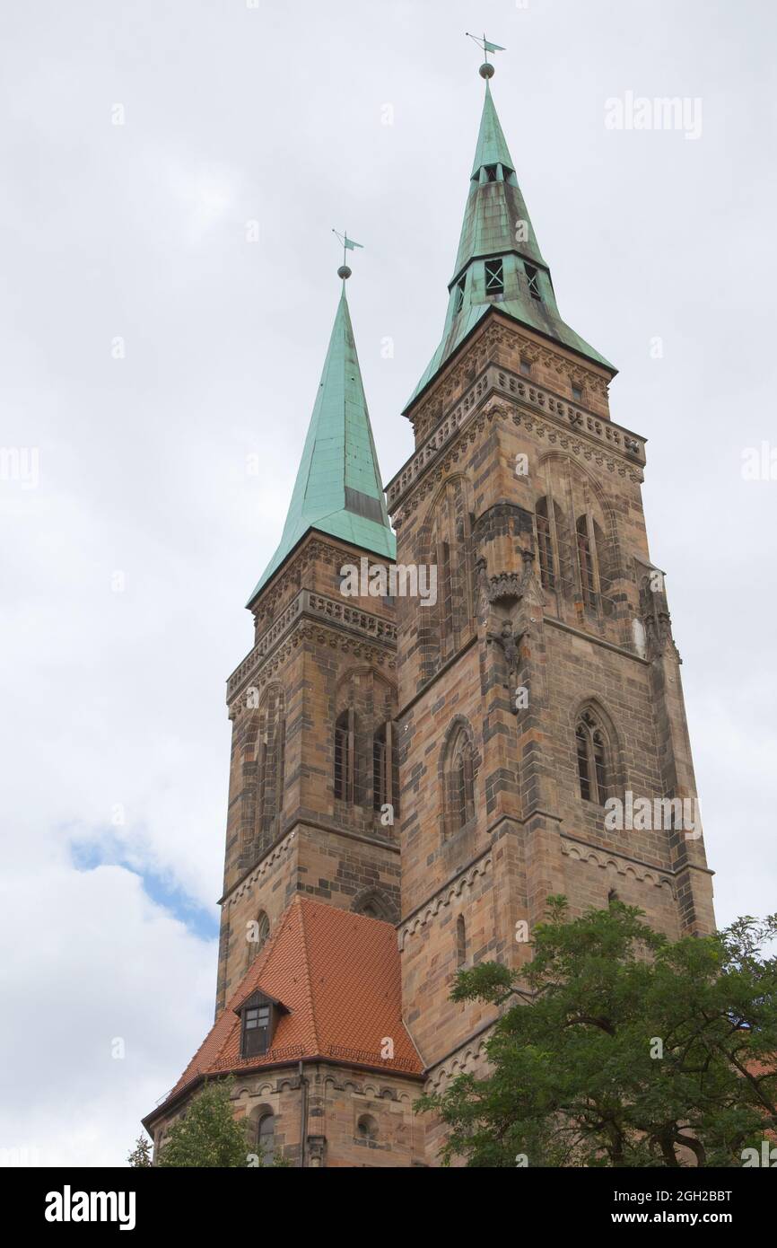 Church in Nurnberg Germany. Two towers in the sky. Stock Photo