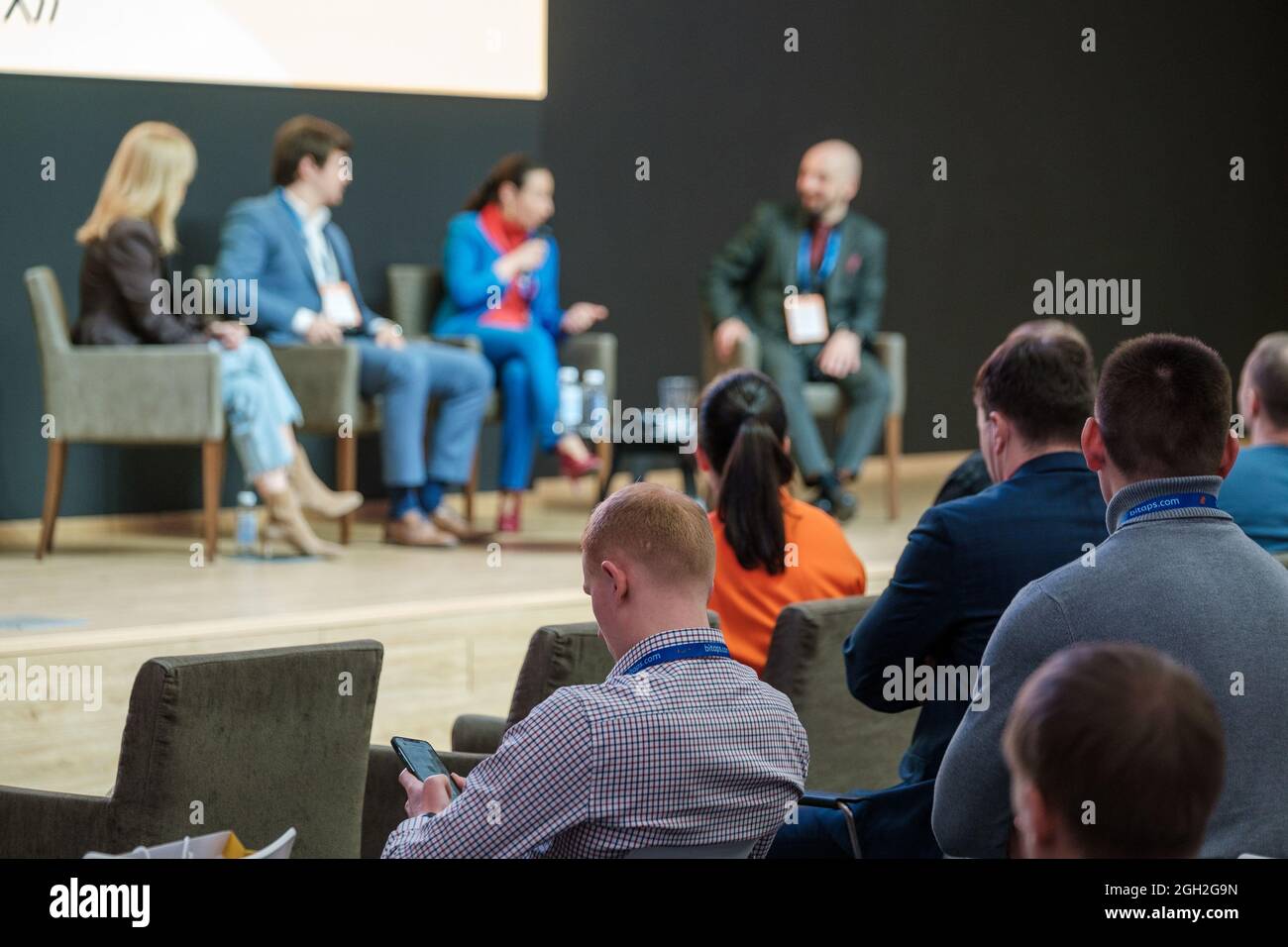 Audience listens to the lecturer Stock Photo - Alamy