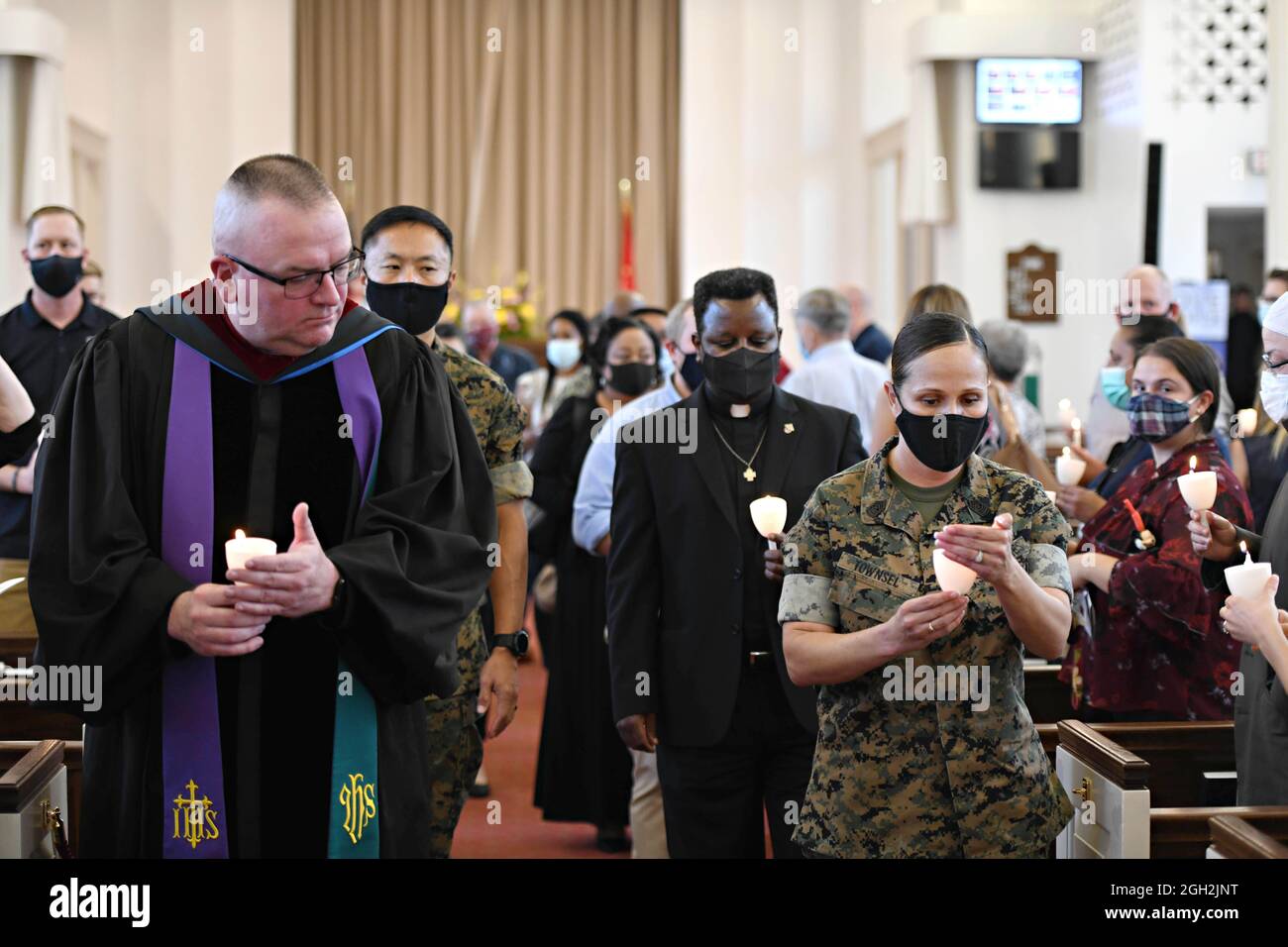 Quantico, United States. 02nd Sep, 2021. U.S. Marines and family members light candles during a vigil in memory of the 13 service members killed during evacuation of Kabul at the Marine Memorial Chapel September 2, 2021 at Quantico, Virginia, USA. Credit: LCpl. Joseph Cooper/US Marines Photo/Alamy Live News Stock Photo