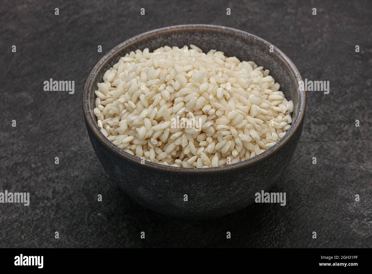 Raw Italian arborio rice for Risotto Stock Photo - Alamy