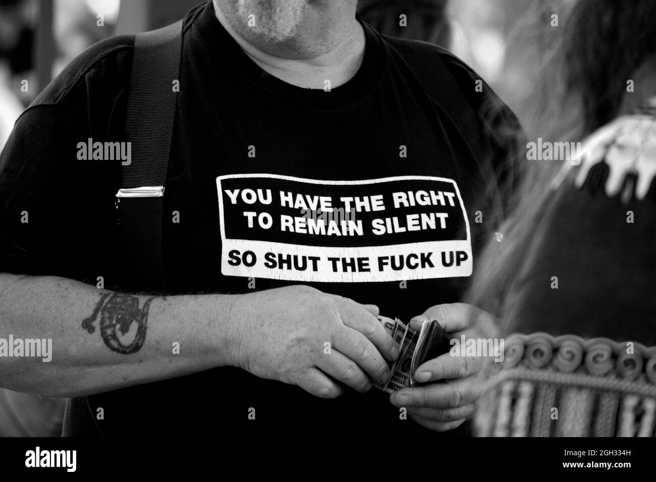 A humorous T-shirt imprinted with a version of a criminal suspect's Miranda Rights. Stock Photo