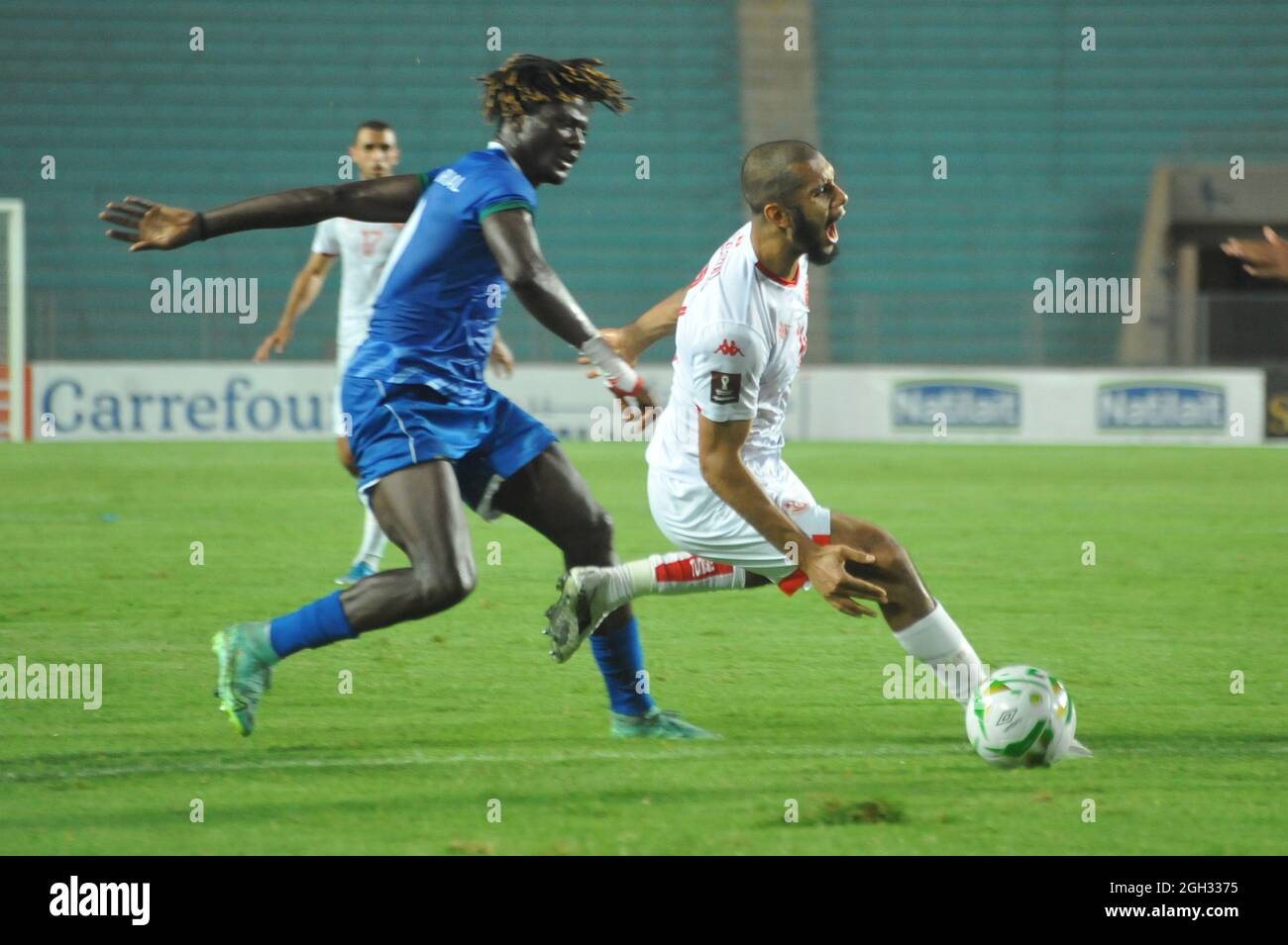 Tunis, Tunisia. 03rd Sep, 2021. TUNIS, TUNISIA - SEPTEMBER 3: Bilel Aissa Laidouni (14) of Tunisia team in action during a match of the 2022 World Cup Qualifiers, between Tunisia and Equatorial Guinea at Rades Olympic Stadium on September 3, 2021 in Tunis, Tunisia. (Photo by Hasan Mrad/ Eyepix Group/Sipa USA) Credit: Sipa USA/Alamy Live News Stock Photo