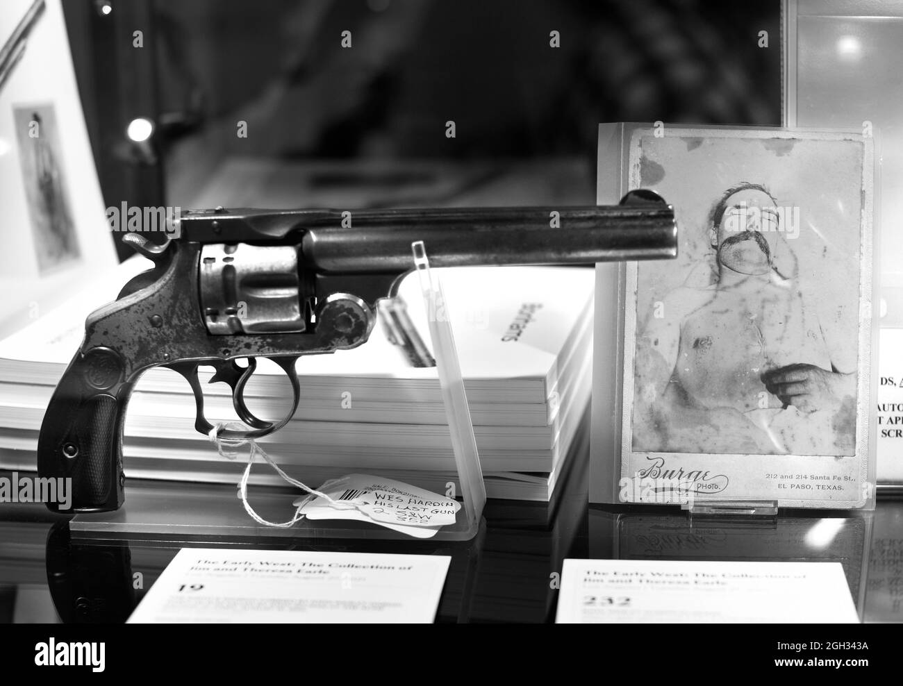 The gun used by an off duty policeman to kill notorious American outlaw John Wesley Hardin in 1895, on display in Santa Fe, New Mexico. Stock Photo