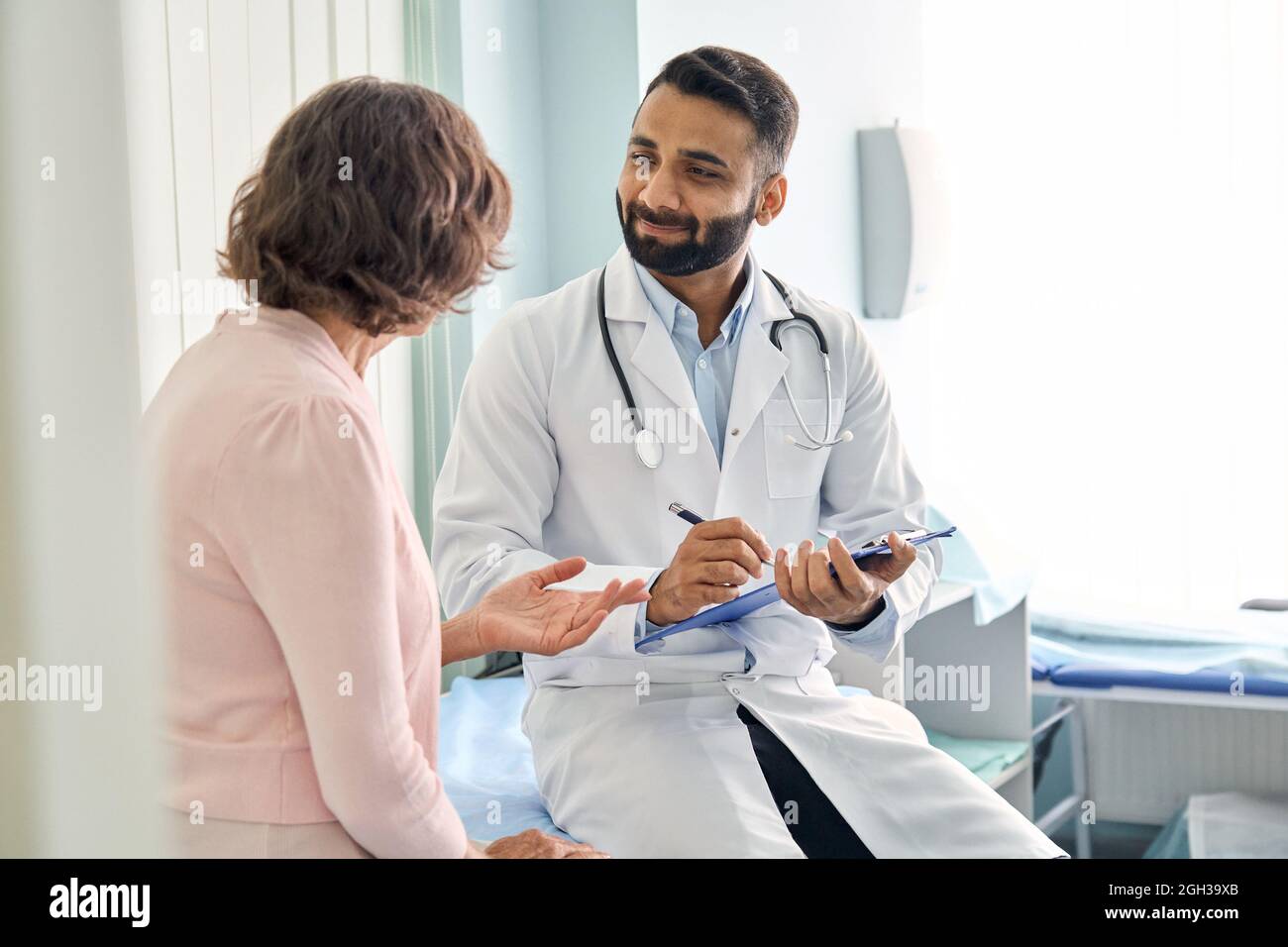 Gp doctor patient consulting hi-res stock photography and images - Alamy
