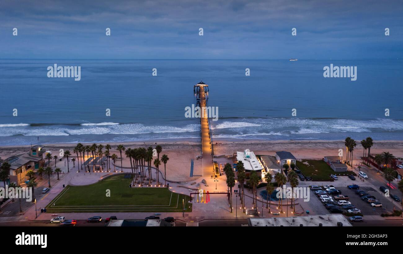 Birdseye view of Imperial Beach Pier and boardwalk at dawn Stock Photo