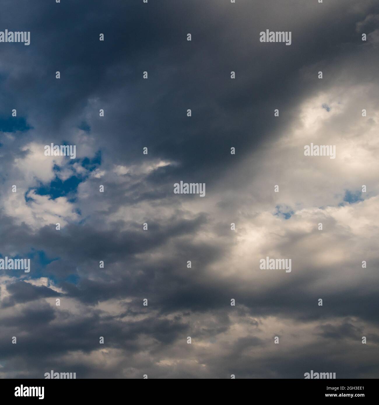 white and gray clouds in a blue sky Stock Photo