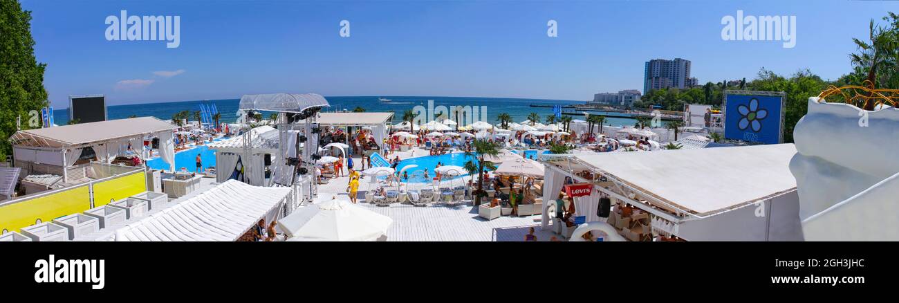 Odessa, Ukraine May 18, 2013: Ibiza pool beach summer club. Elite comfortable beach resort on the beach with palm trees and pools. The restaurant beac Stock Photo