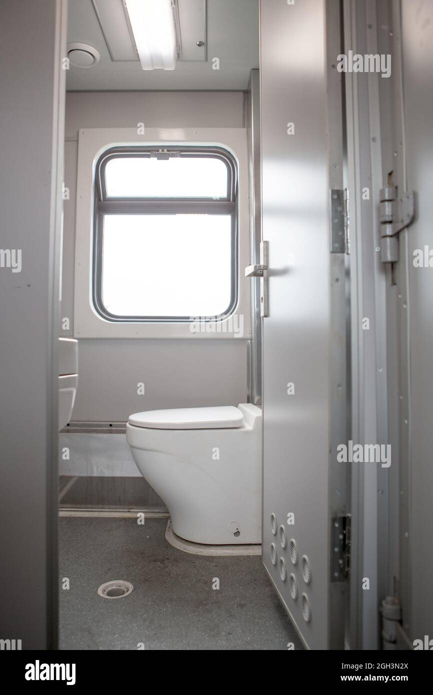 Classic toilet interior on the train. Toilet in the passenger train